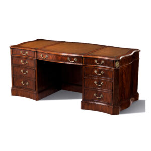 Genuine 3 section non corrected leather top features gold and blind hand tooling. The finest crotch mahogany has been selected for its unique grain, beauty and character. Solid brass hardware and accents adorn this lovely executive desk. All drawers are constructed from solid oak and the use of traditional European dovetail joinery is used on the front and rear of each drawer. File drawers complete the perfect desk for any executive or CEO.